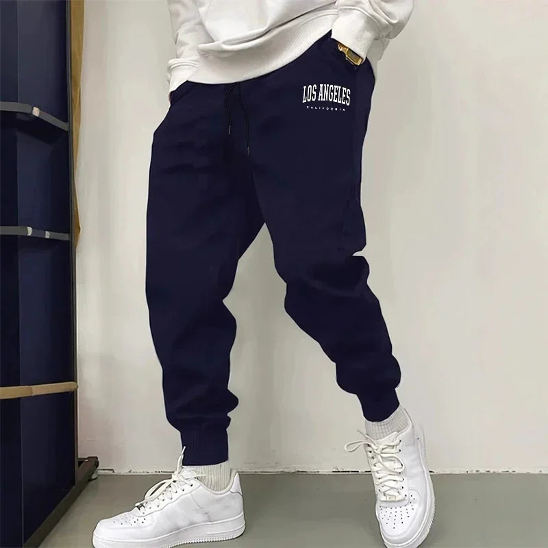 Offres spéciales hommes pantalons de survêtement impression pantalons décontractés salle de sport Fitness sport Jogging hom