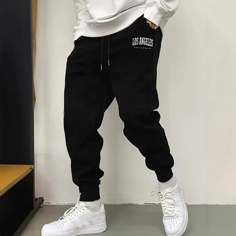 Offres spéciales hommes pantalons de survêtement impression pantalons décontractés salle de sport Fitness sport Jogging hom